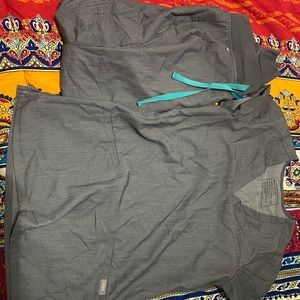 FIGS XXS scrub set. Bottoms are joggers. Not worn much. No stains etc.